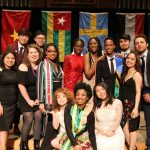 International students pose at banquet