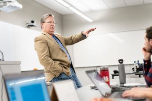 Professor teaching in front of a class