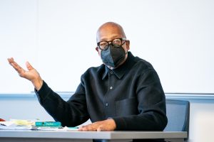 Faculty teaching wearing a mask