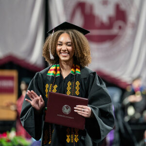 Student in cap and gown.