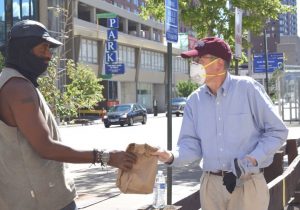 President Paul delivering hot lunches