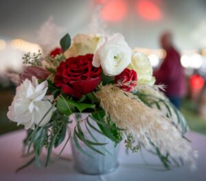 A bouquet of red and white flowers