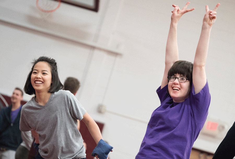 Augsburg student-athlete plays bags with a Special Olympics athlete