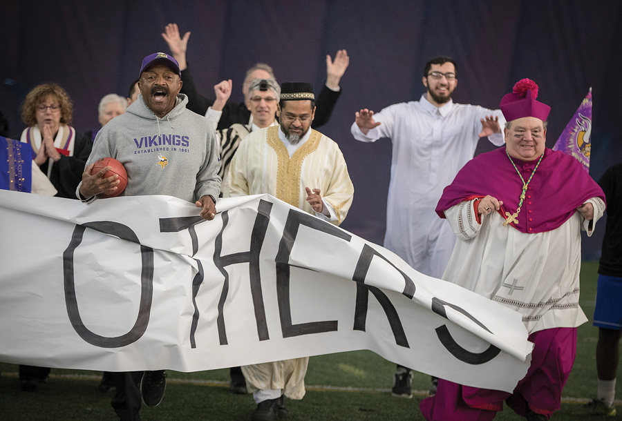 Faith leaders from across the Twin Cities and former Minnesota Vikings player