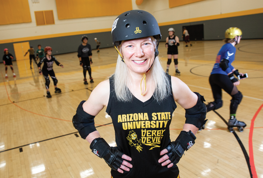 Portrait of Devoney Looser at roller derby practice