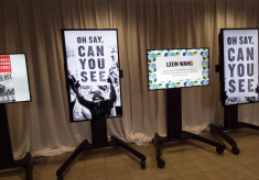 Screens displaying art and messaging about the Nobel Peace Prize Forum topic, Paradox of Peace