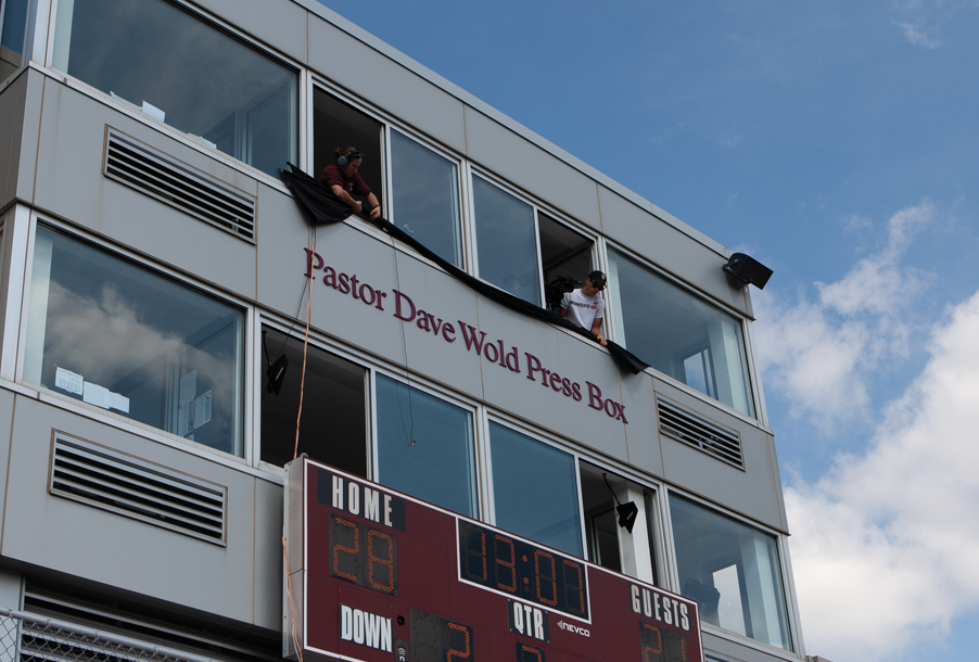 Press box showing the new name, Pastor Dave Wold Press Box