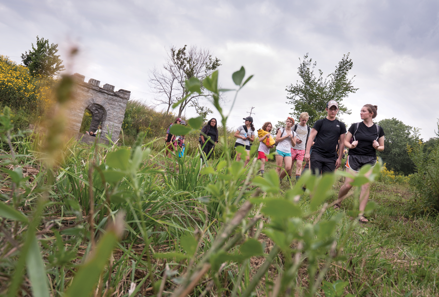 Students walking on a trail