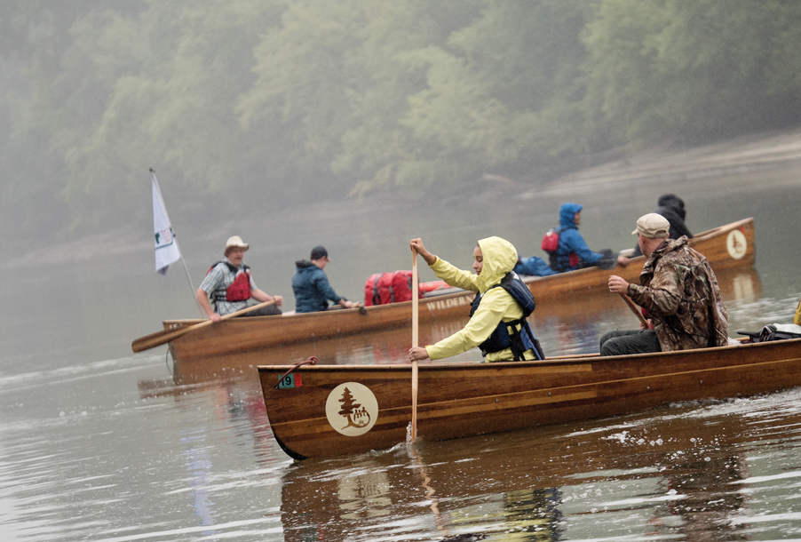 Students canoeing on the river