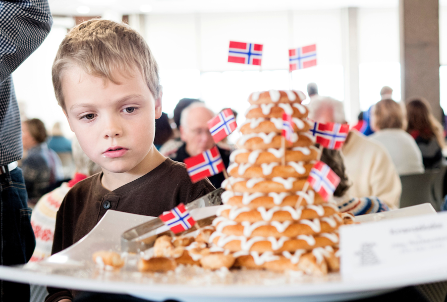 Boy looking at Norwegian cookies