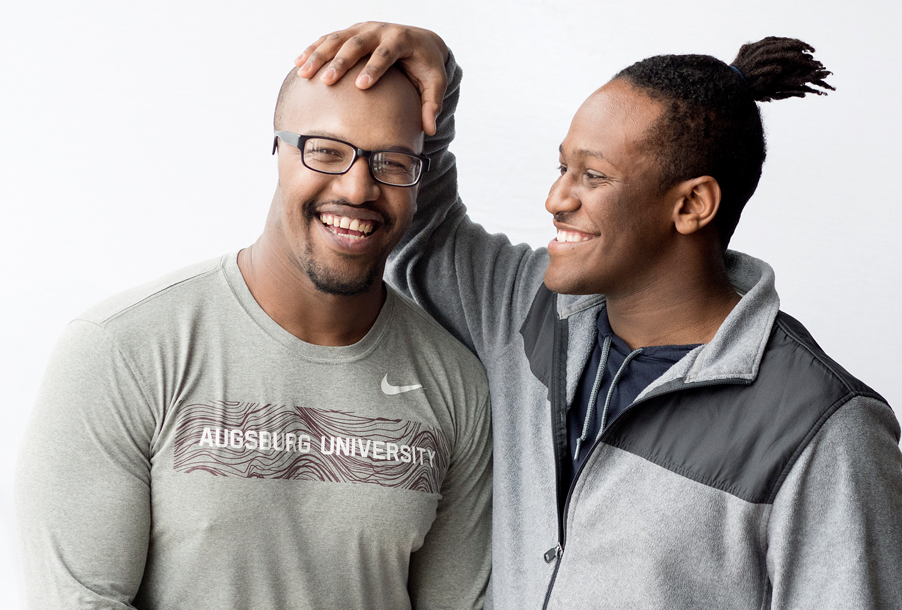 Candid portrait of Mustafa Adam ’18, left, and his brother Shihab Adam ’22