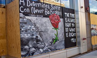 "A determined spirit can never be broken" mural quote, and "The time is always right to do what is right" - MLK mural 