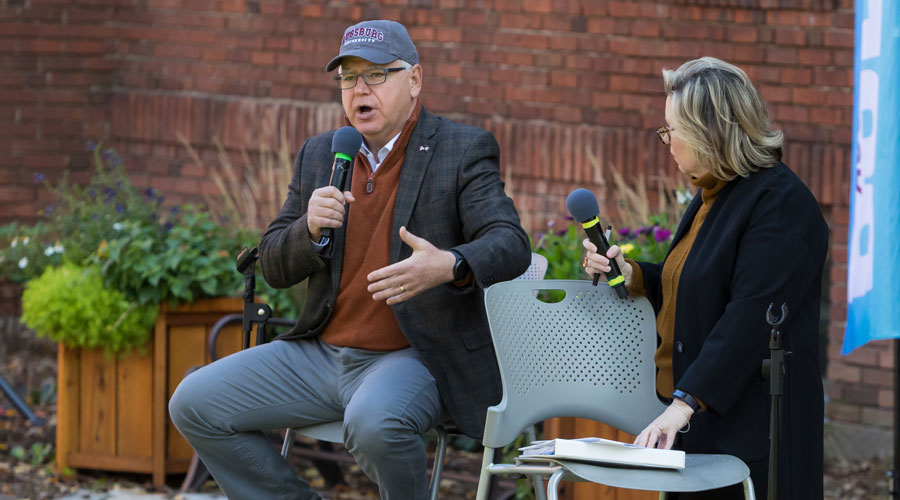 Governor Tim Walz and his wife Gwen Walz speaking for the Augsburg Bold series in the quad