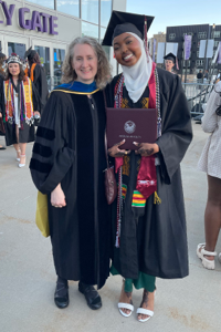 Abdi (right) and Gerlach (left) outside US Bank Stadium for Augsburg's commencement ceremony, 2023 (Courtesy photo)