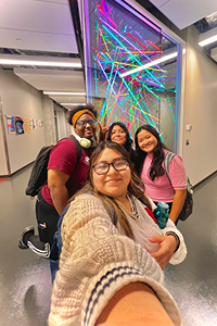 <strong>Elsy Cruz Parra</strong> (center) with classmates inside Hagfors Center (Courtesy photo)