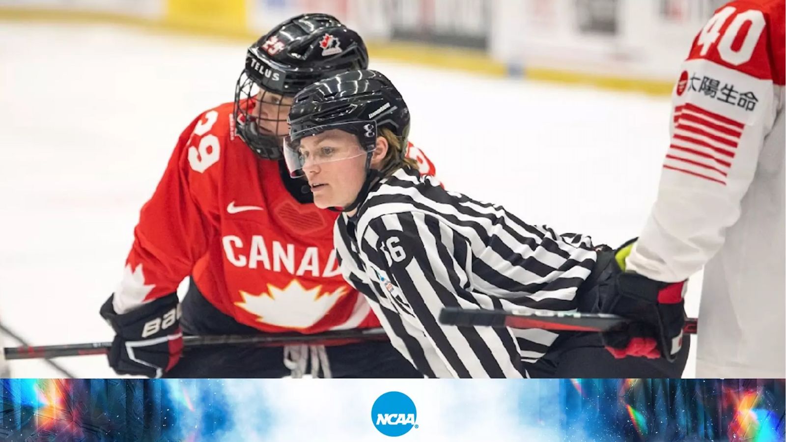 Wearing black and white striped referee gear, Sarah Buckner leans down in between two hockey players on the ice.