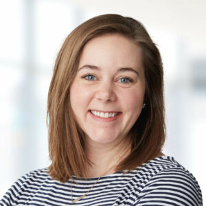 headshot of kelsey reif in a striped shirt