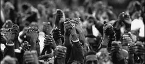 Photo of hands being held at the Million Man March in 1995