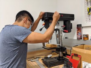 Edwin Panora using a drill press