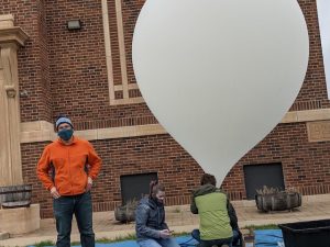 Augsburg students outside with weather balloon