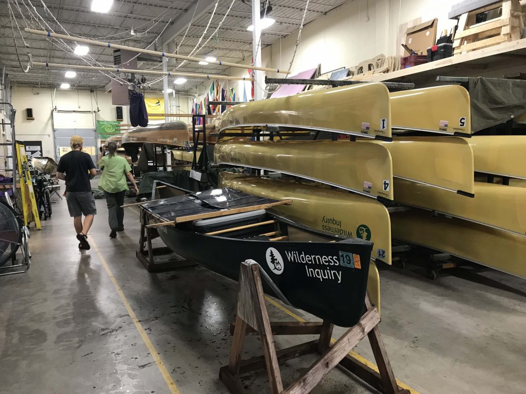 Stacks fo canoes at Wilderness Inquiry