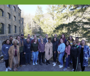 The group of 22 authors outside at Montreat.