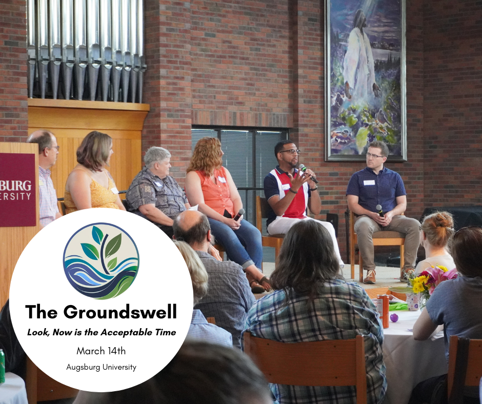 panel of speakers from our groundswell 2023 event up on stage while the audience is at round tables. 