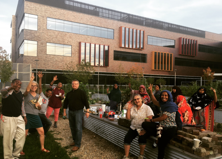 A picture of the garden with many of our happy gardeners