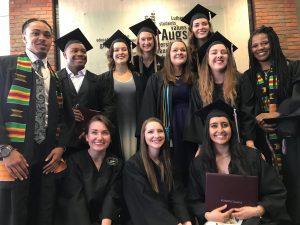 Graduating sociology majors are all smiles after receiving their diplomas.