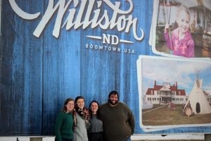 Sociology majors Jenn Kochaver, Ellen Sachs, Emily Campbell, and Mark Daniels visit "Boomtown USA," otherwise known as Williston, ND.