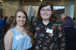 Photo of Augsburg student researchers Holly Kundel (left) and Olivia Fitch (right) at Zyzzogeton 2019.